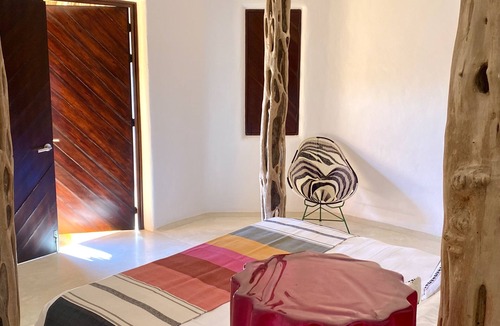 Costa Careyes Villa | A Mexican oasis of artistry + style with private stairs to beach and boat.