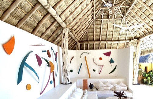 Costa Careyes Villa | A Mexican oasis of artistry + style with private stairs to beach and boat.