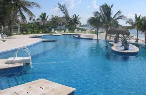 Puerto Morelos Condo | Affordable Luxury-Newly Renovated Beachfront Condo-Vacation Paradise