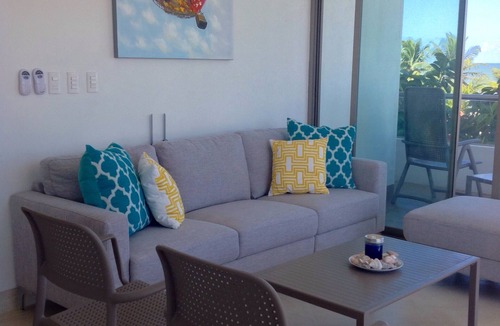 Chicxulub Puerto Apartment | Amazing Sunsets, breeze and Sea View from Bdr and Living room