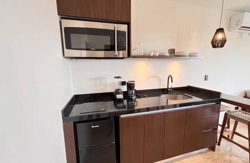 Mahahual Apartment | Apartment Balcony to Paradise: Sea and Jungle