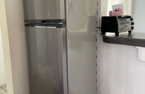 Crucecita Apartment | Apartment with pool 10 minutes from Playa Chahue