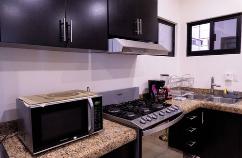 Crucecita Apartment | Aqua&Terra Suite. Centrally located and 15 minutes from the beach.