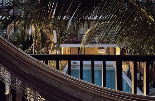 Isla Holbox Apartment | Artistic Loft Steps from the Beach w/Pool View