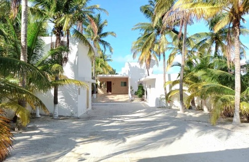 Telchac Puerto House | Beachfront House: Pool, kayaks, and a large terrace. Perfect for families. Pet-Friendly.