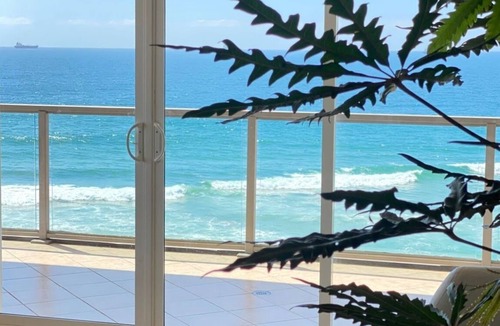 Miramar Condo | Beachfront Penthouse with Large Private Rooftop Patio with Wood Burning Firepit