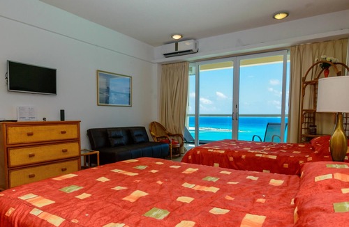 Punta Cancun Apartment | Beachfront studio with amazing views! Located on the best beach in Cancun!