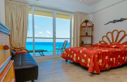 Punta Cancun Apartment | Beachfront studio with amazing views! Located on the best beach in Cancun!