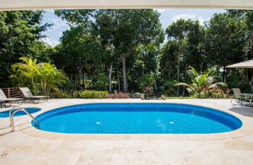 Akumal House | Beautiful Villa surrounded by lush jungle facing golf course within Resort