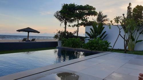 Phuoc Thuan Villa | Biệt thự mặt tiền biển-hồ bơi riêng-4 phòng ngủ