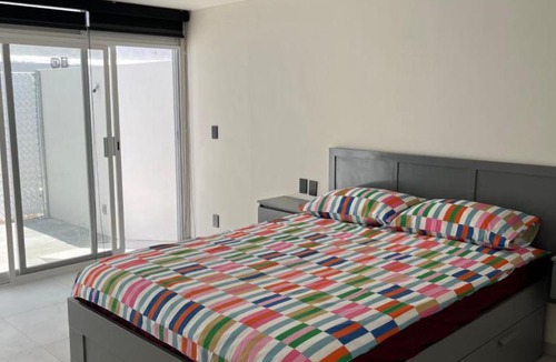 Guadalajara Apartment | Bonito espacio de habitación con terraza, cocina y baño privado en Oasis Malvas - World Cup visitors welcome!