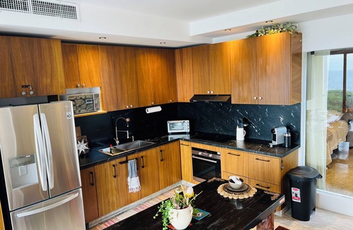 Isla Mujeres Condo | Brand new modern-bohemian, Ocean front, 2 bed, 2 bath condo. With pool.
