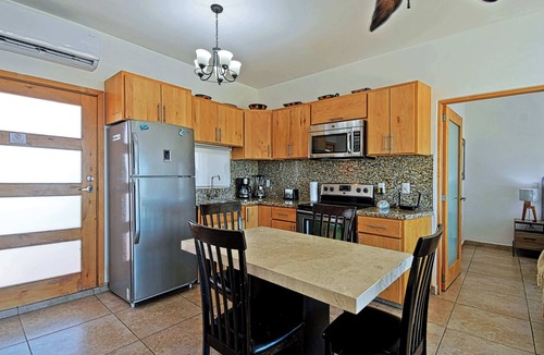 Lomas de Palmira Condo | Breathtaking Ocean Views, Pool & Balcony Bliss