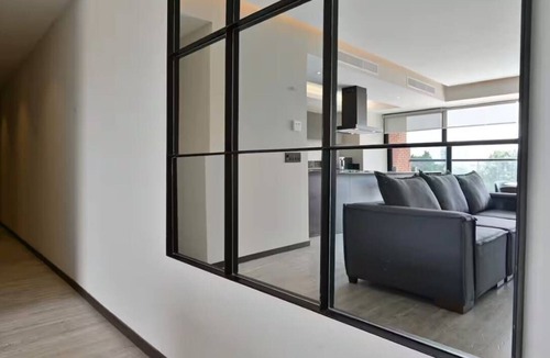 Zona Minerva House | Bright 3BR | Pool, gym & city views