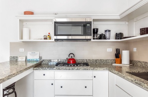 La Paloma Apartment | Bright dog-friendly suite with kitchenette, heated outdoor pool, hot tub, patio