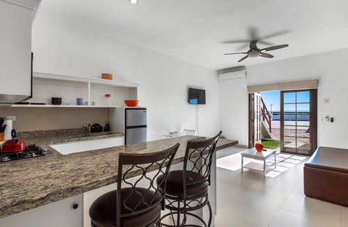 La Paloma Apartment | Bright dog-friendly suite with kitchenette, heated outdoor pool, hot tub, patio