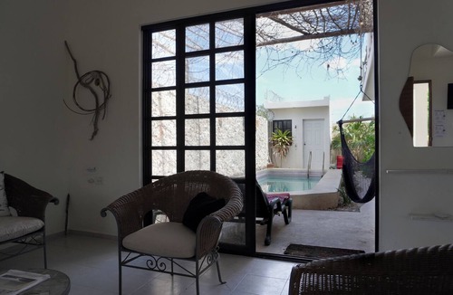 Chicxulub Puerto House | Casa Calandria, a beautiful quiet home with swimming pool & near the beach