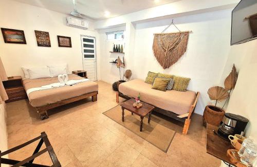 El Cuyo Hotel | Casa Maria Bonita & Restaurant El Cuyo by Spot Rentals