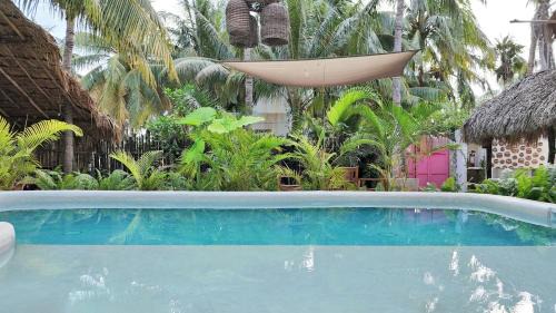 El Cuyo Hotel | Casa Maria Bonita & Restaurant El Cuyo by Spot Rentals