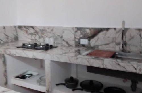 Puerto San Carlos Apartment | Casa Tamarindo, Queen size bed, Fully equipped kitchen, Downtown area
