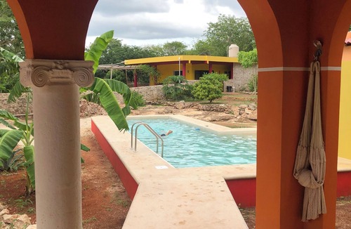 Izamal House | Charming bungalow in peaceful Izamal with lap pool and gorgeous garden