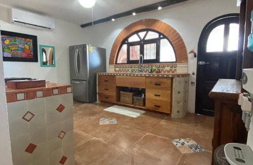 Merida House | Charming single level beachfront home! Garden oasis & private waterfall pool.