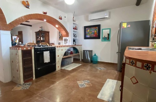 Merida House | Charming single level beachfront home! Garden oasis & private waterfall pool.