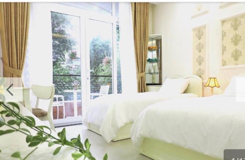 District 4 Hotel | Chez Lotus Rose