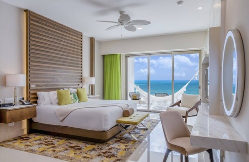 Playa Mujeres Resort | Chic Oceanfront Resort ~ Private Balcony ~ Playa Mujeres’ Tranquil White Sands
