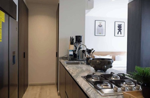 Providencia Condo | City-view condo w/pool & free parking