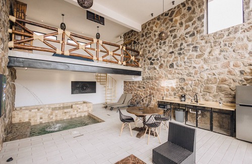 San Carlos Apartment | Climatized indoor pool/studio, stone walls -modern/rustic, very intimate space.
