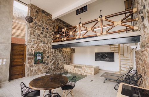 San Carlos Apartment | Climatized indoor pool/studio, stone walls -modern/rustic, very intimate space.