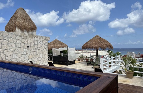 Colonia Centro Apartment | Coastal Escape Suite:Private Balcony, King Bed & Steps to the Cozumel Waterfront