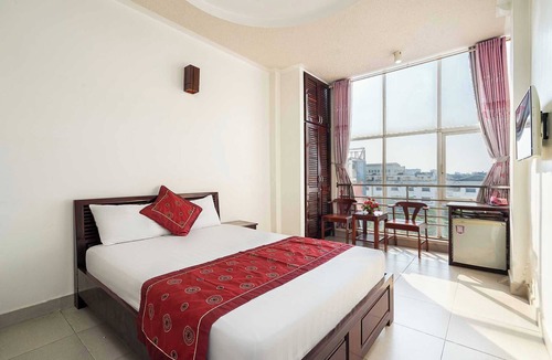 Tan Binh Hotel | Collection O Dinh Dinh Hotel - Near Tan Son Nhat Airport