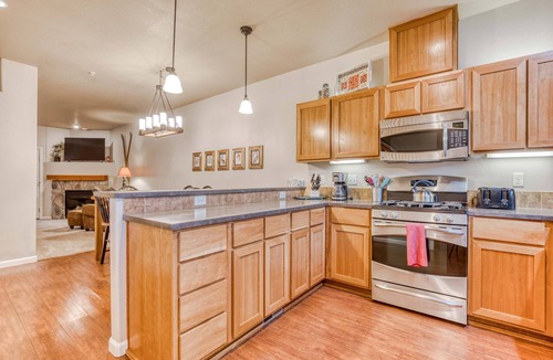 Government Camp Condo | Comfortable condo with fireplace, heated pool, hot tub, balcony & full kitchen