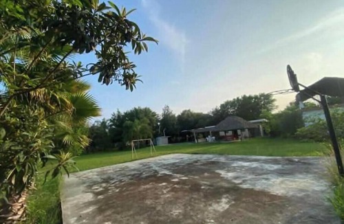 Cadereyta Jimenez Cabin | Country house with a pool, lush gardens, and trees