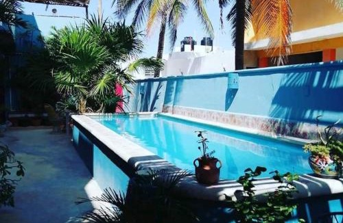Puerto Yucalpeten Apartment | Courtyard family room