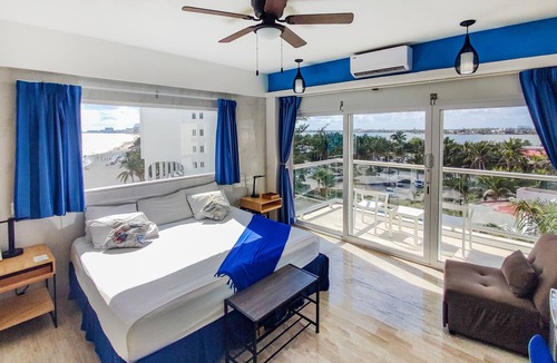 Punta Cancun Condo | Cozy Condo Beachfront Bedroom w/Beach View & Unbeatable Location