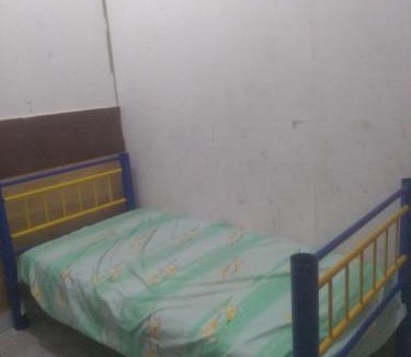 Villa de Guadalupe House | cuarto básico compartido