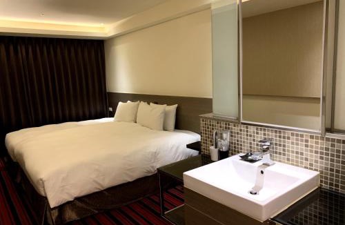 West District Hotel | de rěve Express Hotel