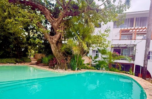 Playacar Fase II Condo | Deluxe Modern Condo, with Cenote on Site. 24/7 security 5' walk to beach