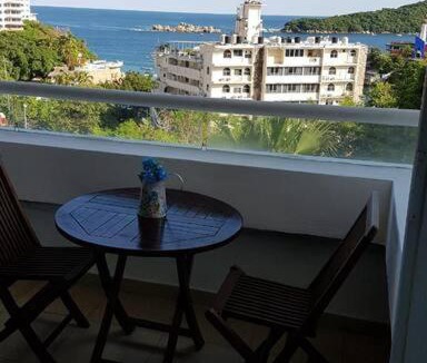 Caleta Apartment | Departamento con vista al mar, albercas y juegos