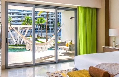 Playa Mujeres Resort | Dive Into Luxury: Swim-Up 2 Bedroom Suite at Garza Blanca Resort, Cancun