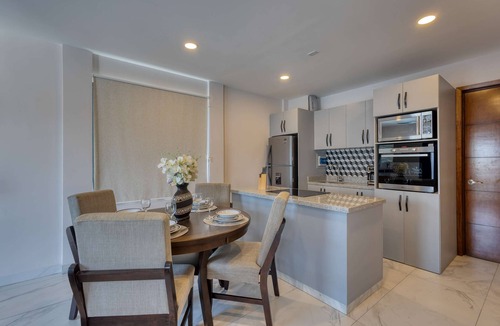 Downtown Cabo San Lucas Apartment | Dog-friendly apartment with rooftop infinity pool, gym, central AC, & balcony