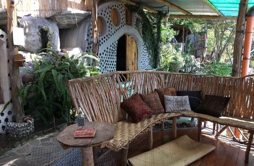 Pasajcap House | Earthship 3-level apt., portside, connected to an outdoor kitchen with a view.