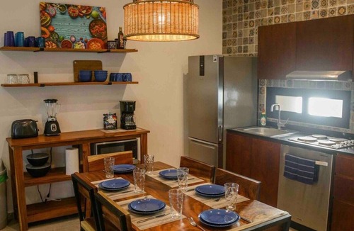 Bacalar Condo | Elegant 2-Bedroom 2-Bath Retreat with Rooftop Oasis & Pool