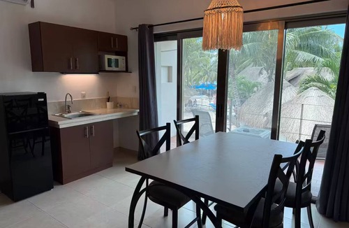 Costa Maya Apartment | Enjoy a Caribbean beach a few feet from your bed