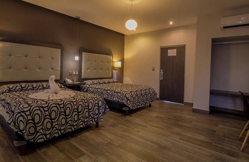 Centro Hotel | Enjoy Four Spacious Lavish Rooms Perfect for Families or Friends in Merida