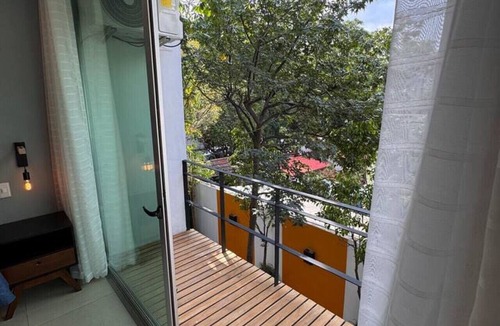 Roma Sur Apartment | Escape to an exclusive duplex with wine and terrace