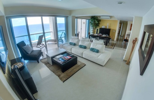 Zona Hotelera Norte Condo | Escape to this amazing Beachfront condo at Peninsula Grand Cozumel!